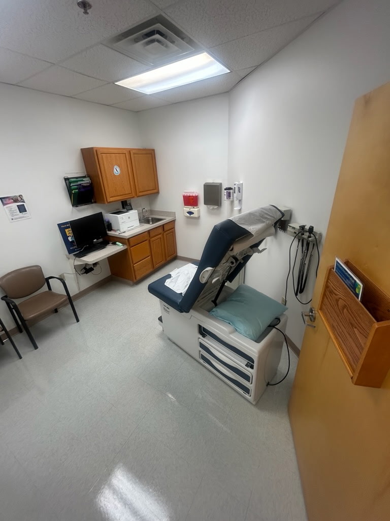 Exam room after cleaning with refinished floor